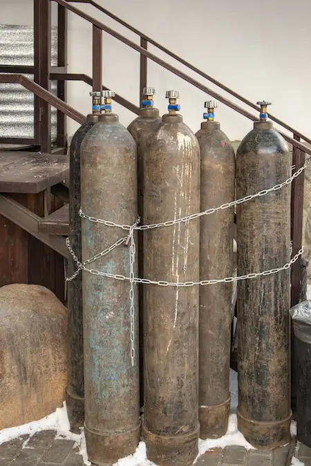 close-up-of-steel-cylinders-with-compressed-gas-2026-01-06-10-10-14-utc